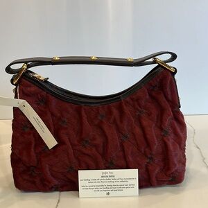 Leslie Hsu Genuine Leather. Tag has Lana scarlet puckered star pony.